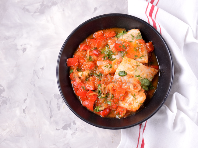 Recette Mijoté de poisson à la tomate et courgettes fondantes